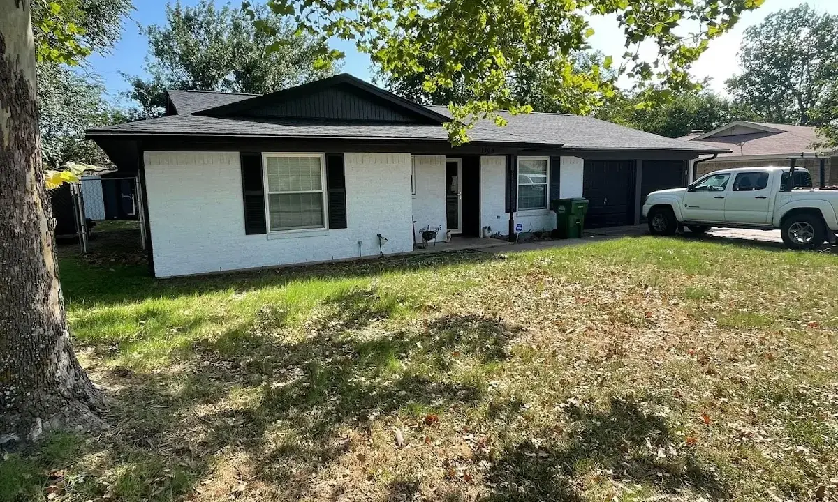 Professional roofing crew working on a residential roof in Cottage Lake